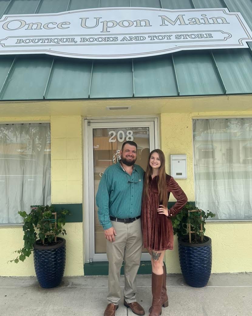 Anthony and Jennifer Canevari outside Once Upon Main at 208 N Main Avenue