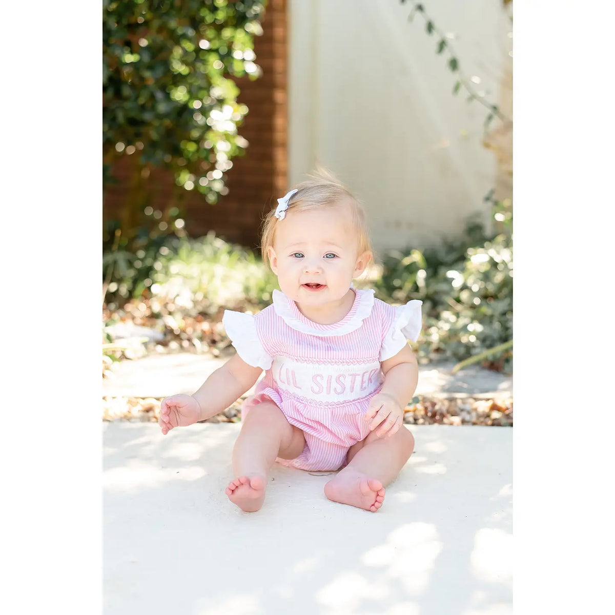 Pink Lil Sister Smocked Romper